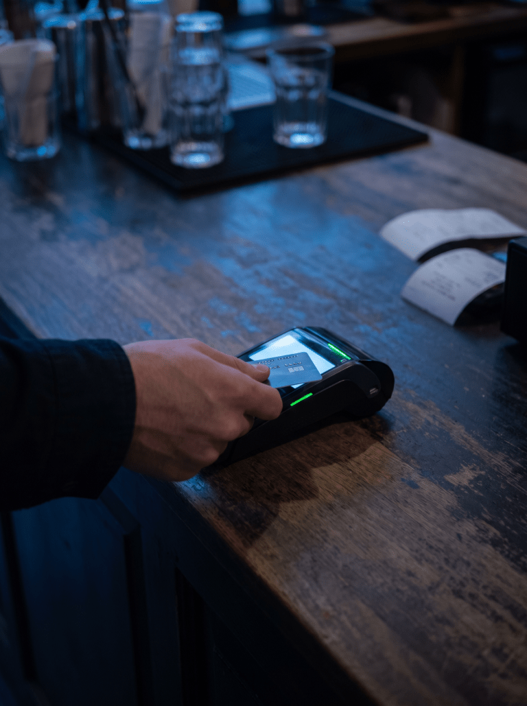 Photo — POS terminal with linked video overlay